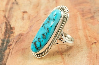 Genuine Sleeping Beauty Turquoise set in Sterling Silver Ring. The Sleeping Beauty Turquoise mine is located in Gila County, Arizona. Created by Navajo Artist Kathy Yazzie. Signed by the artist.